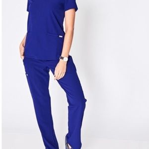 Figs casma top in deep royal blue. Size small.
